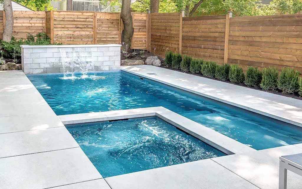 Backyard Paradise Pools showcases the Leisure Pools Limitless fiberglass swimming pool