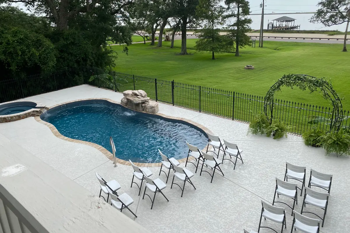 A fiberglass swimming pool installed by Backyard Paradise Pools