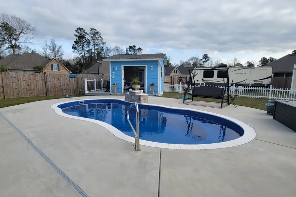 Fiberglass pool installation by Backyard Paradise Pools